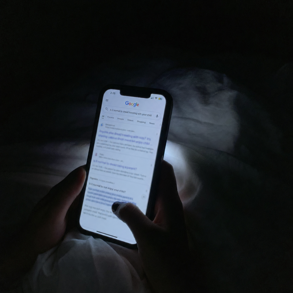 Parent researching kids headphone safety at night